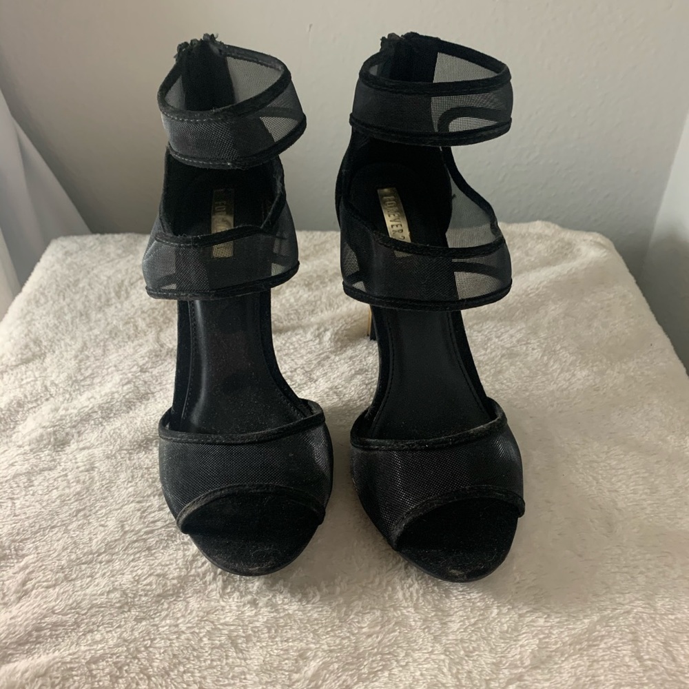 Black high heels gold heel